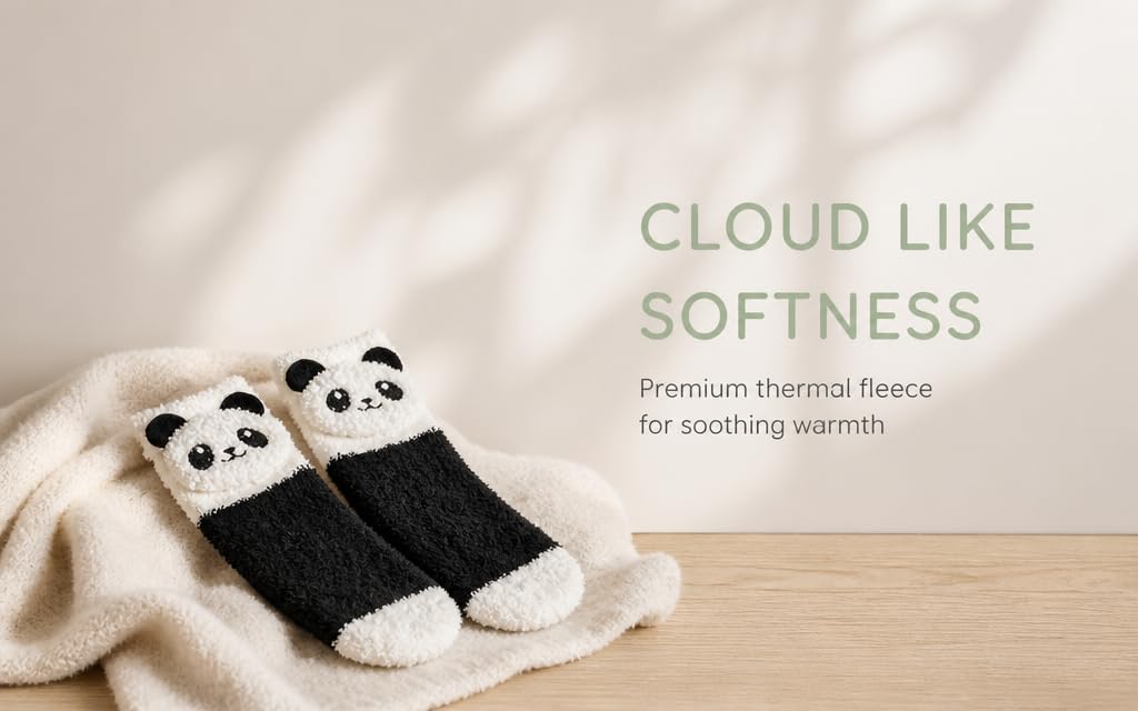 Text reads "CLOUD LIKE SOFTNESS" and "Premium thermal fleece for soothing warmth." Pair of black and white thermal fleece socks displayed on light wooden surface.