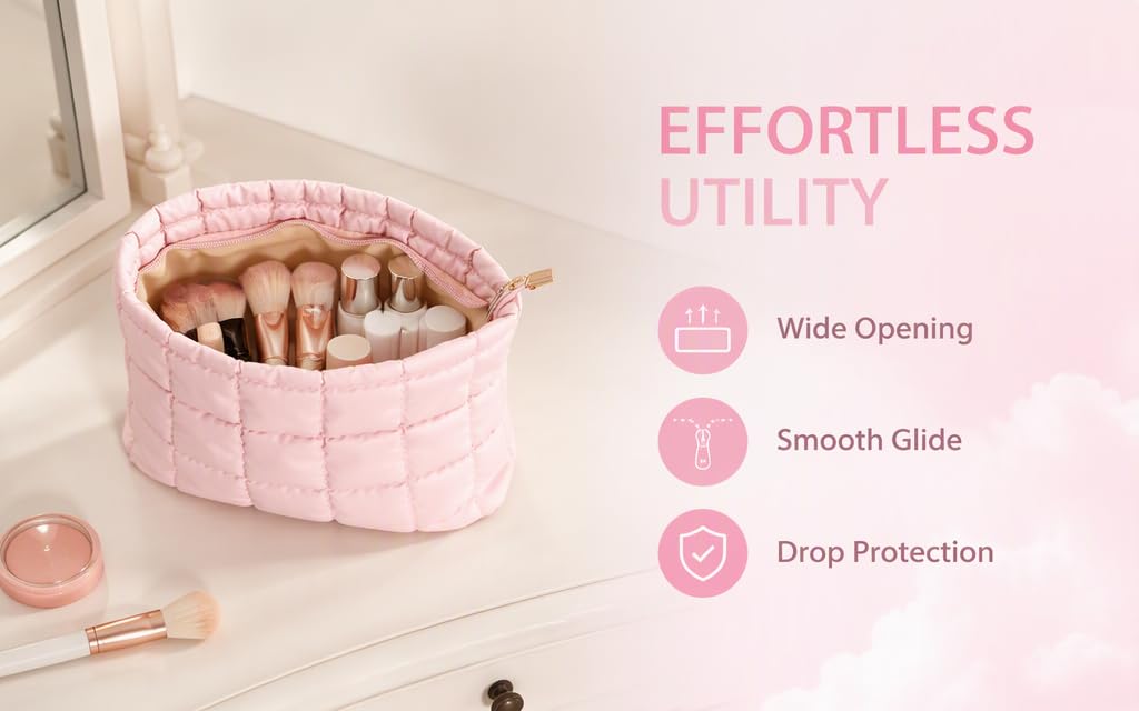Text reads 'EFFORTLESS UTILITY' with numbered features: '1 Wide Opening', '2 Smooth Glide', '3 Drop Protection'. Pink quilted cosmetic storage bag with open top displayed on vanity with makeup brushes inside.
