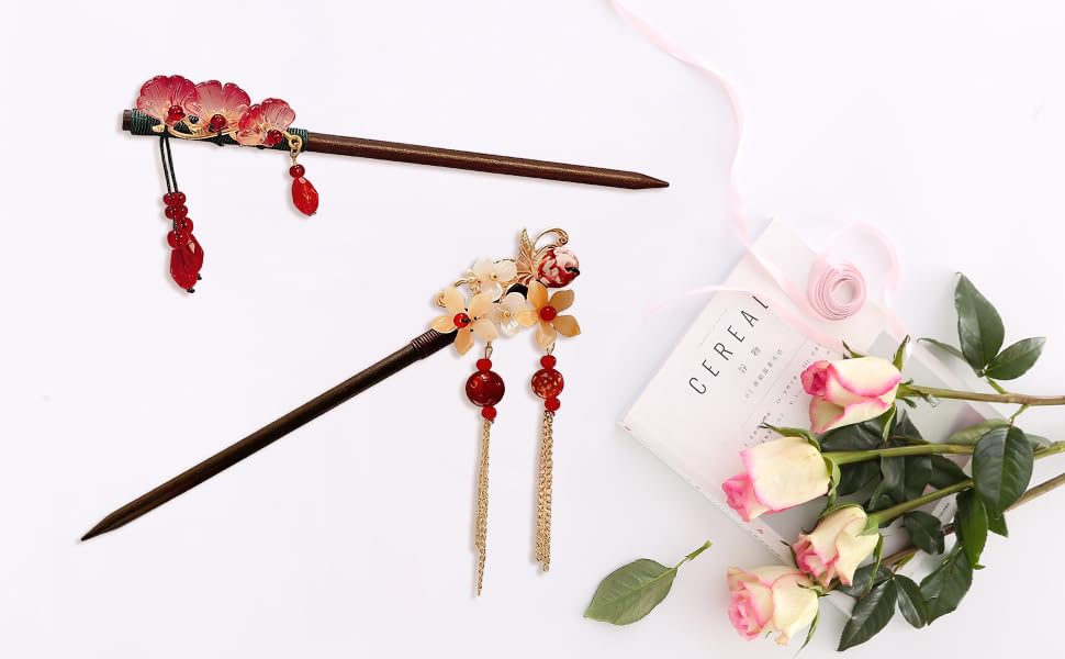 Red-colored decorative or functional items shown from various angles, appears to be accessory or component pieces.